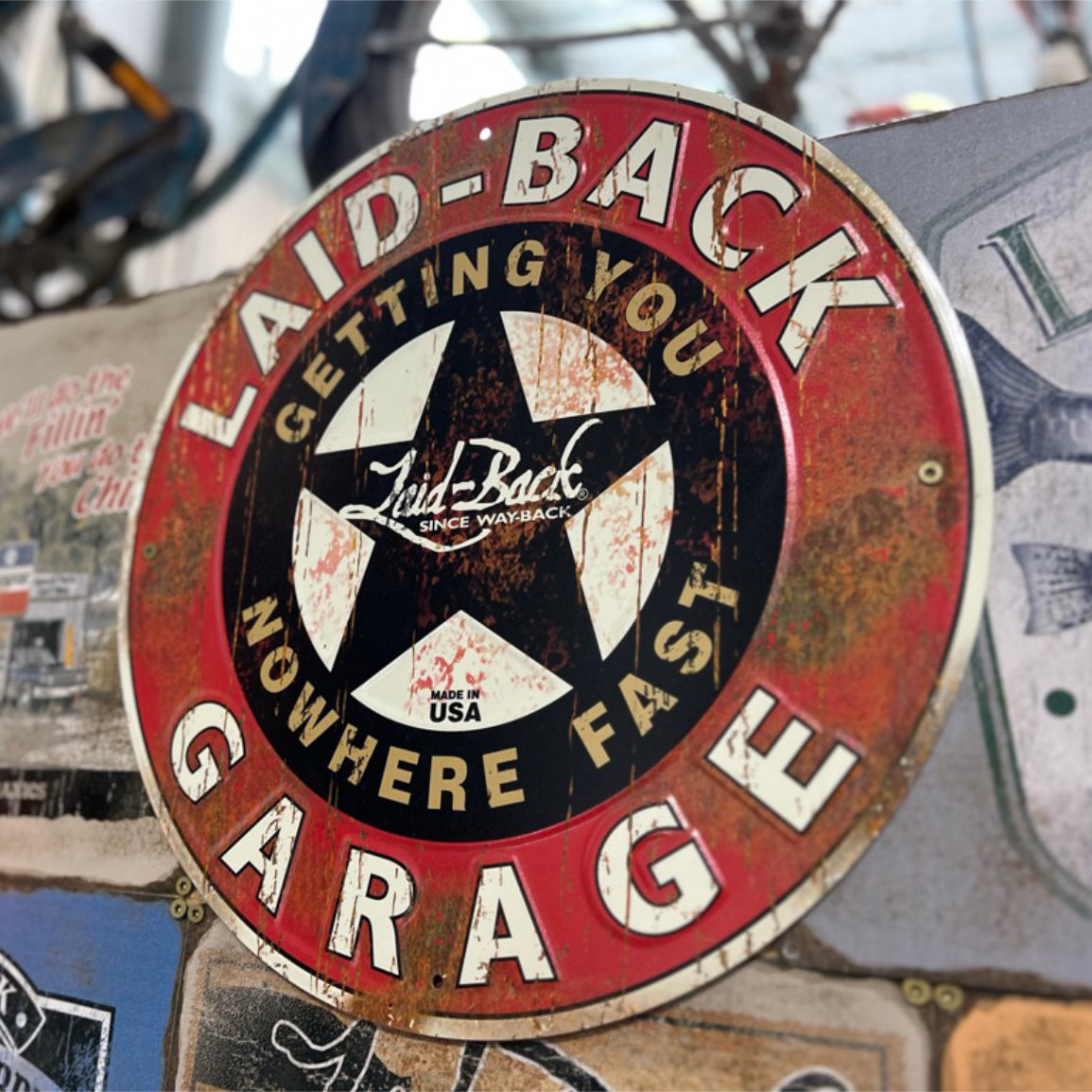 Garage Star Embossed Metal Sign - Laid-Back