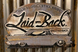 Halfway 57 Embossed Metal Sign - Laid-Back